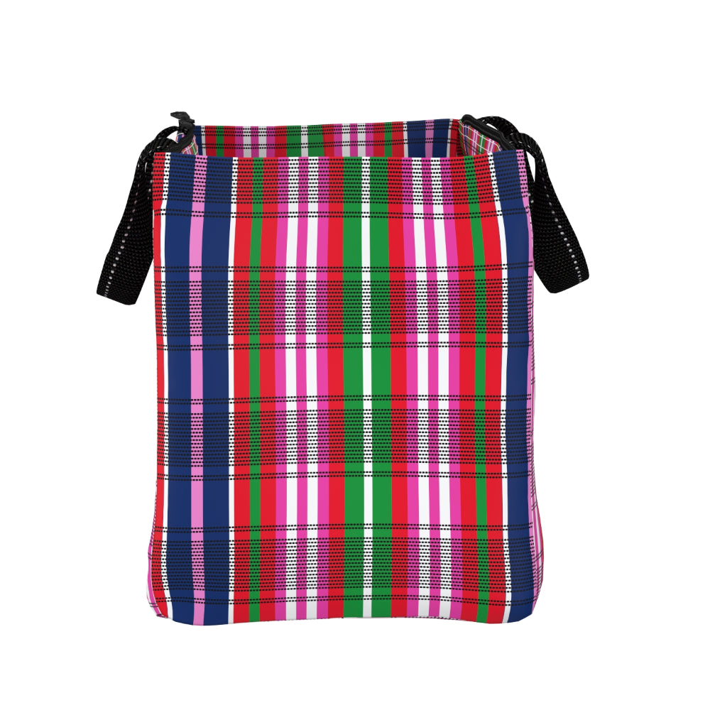A woven tote bag featuring a vibrant multicolor plaid pattern with vertical stripes of pink, red, green, blue, and white, complete with black shoulder straps on a plain white background.