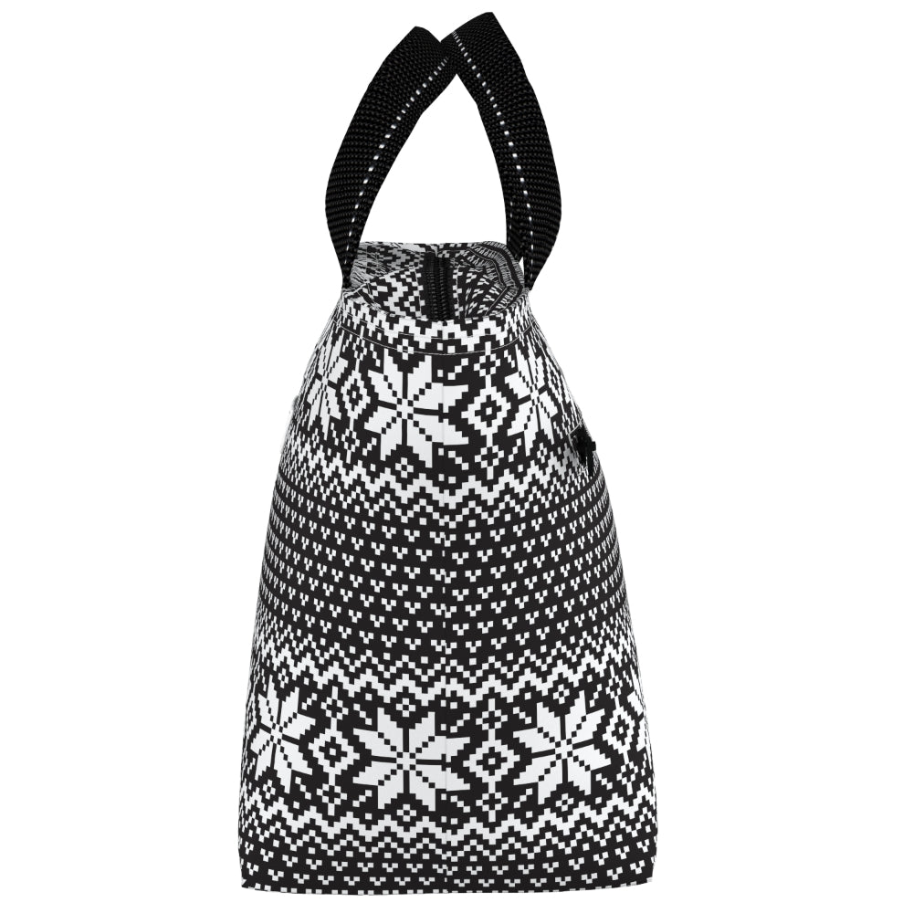 A black and white lunch bag with a Fair Isle snowflake pattern and two black shoulder straps, shown against a plain white background.