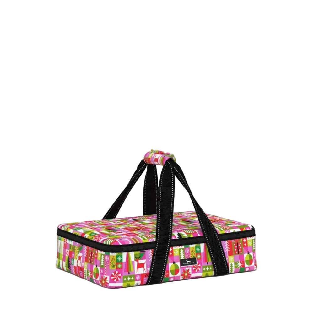 A rectangular soft-sided cooler bag with a colorful Christmas-themed pattern of pink, green, and red gifts, featuring black shoulder straps and a black zipper, set against a plain light gray background.