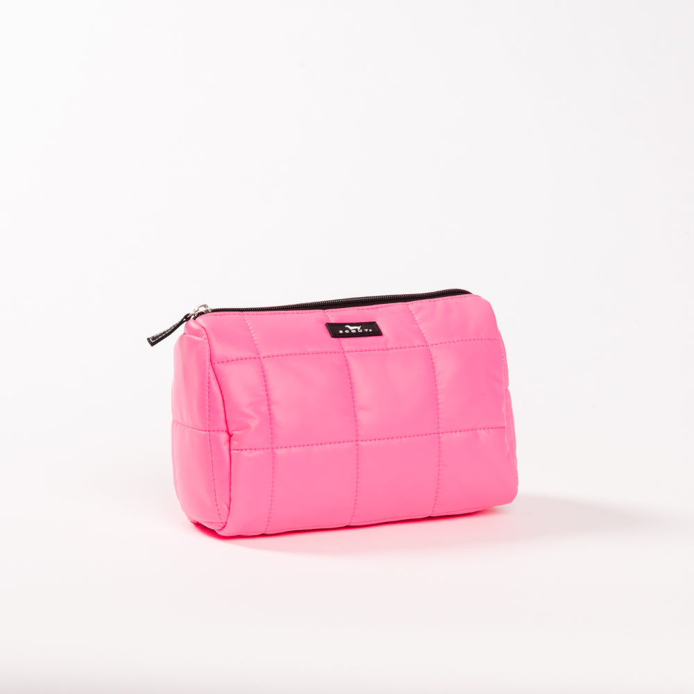 Pink quilted pouch with a black zipper on a white background