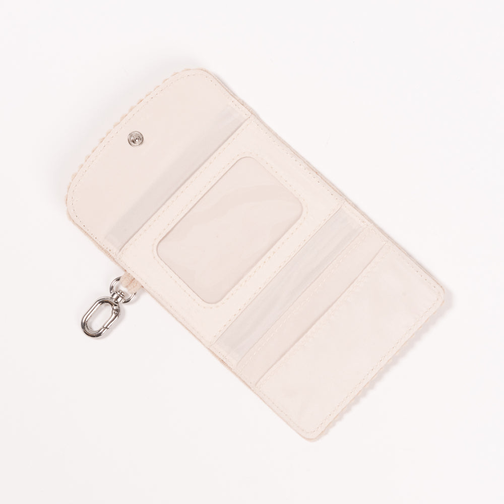 Beige wallet with a zipper on a white background