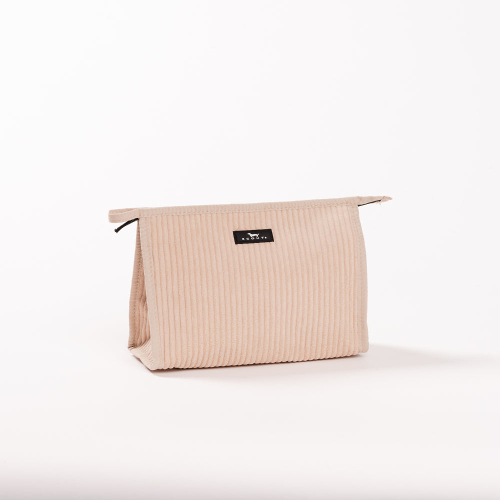Beige toiletry bag with a visible brand label on a white background