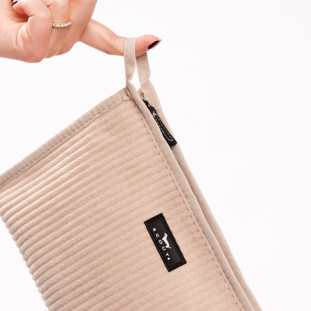 Beige textured pouch with a brand logo on a white background