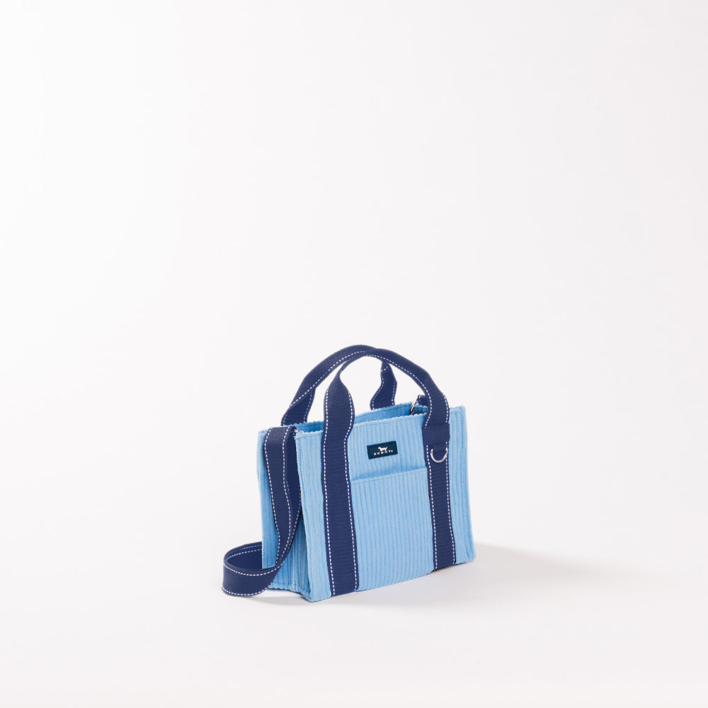 Blue handbag with a strap on a white background