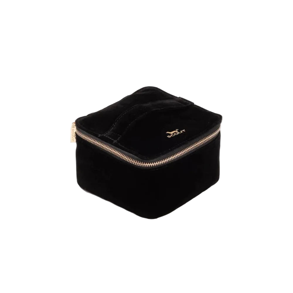 Black velvet jewelry box with gold zipper on a white background