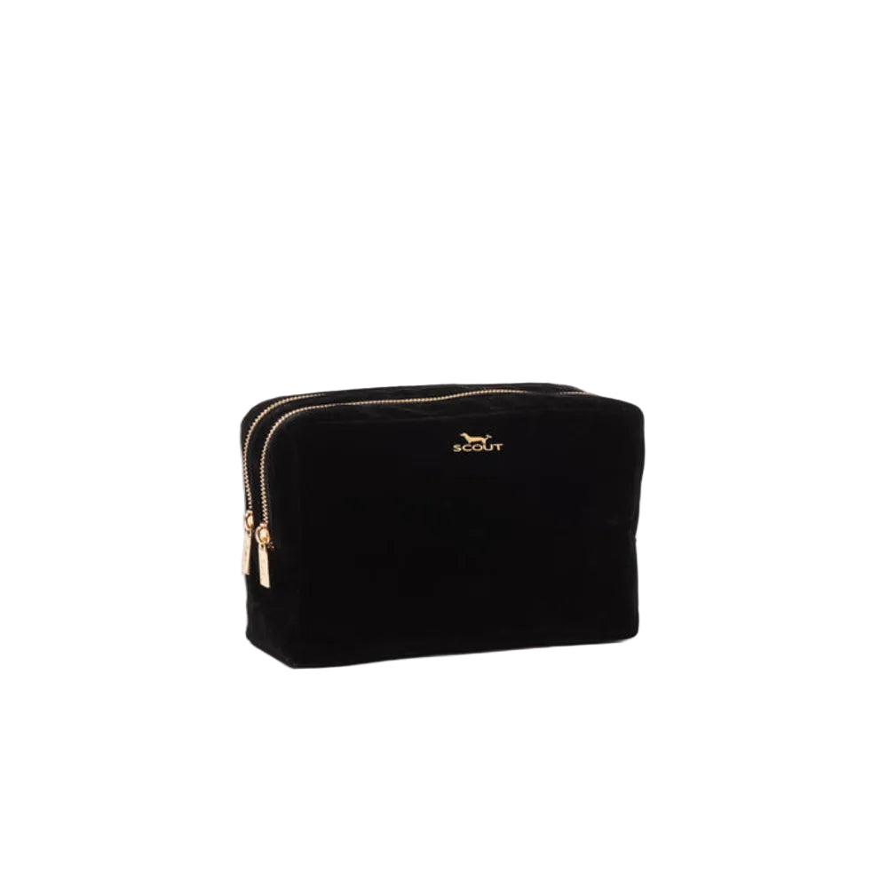 A black velvet cosmetic pouch with gold-tone zippers and a small gold Scout logo on the front, set against a plain white background.