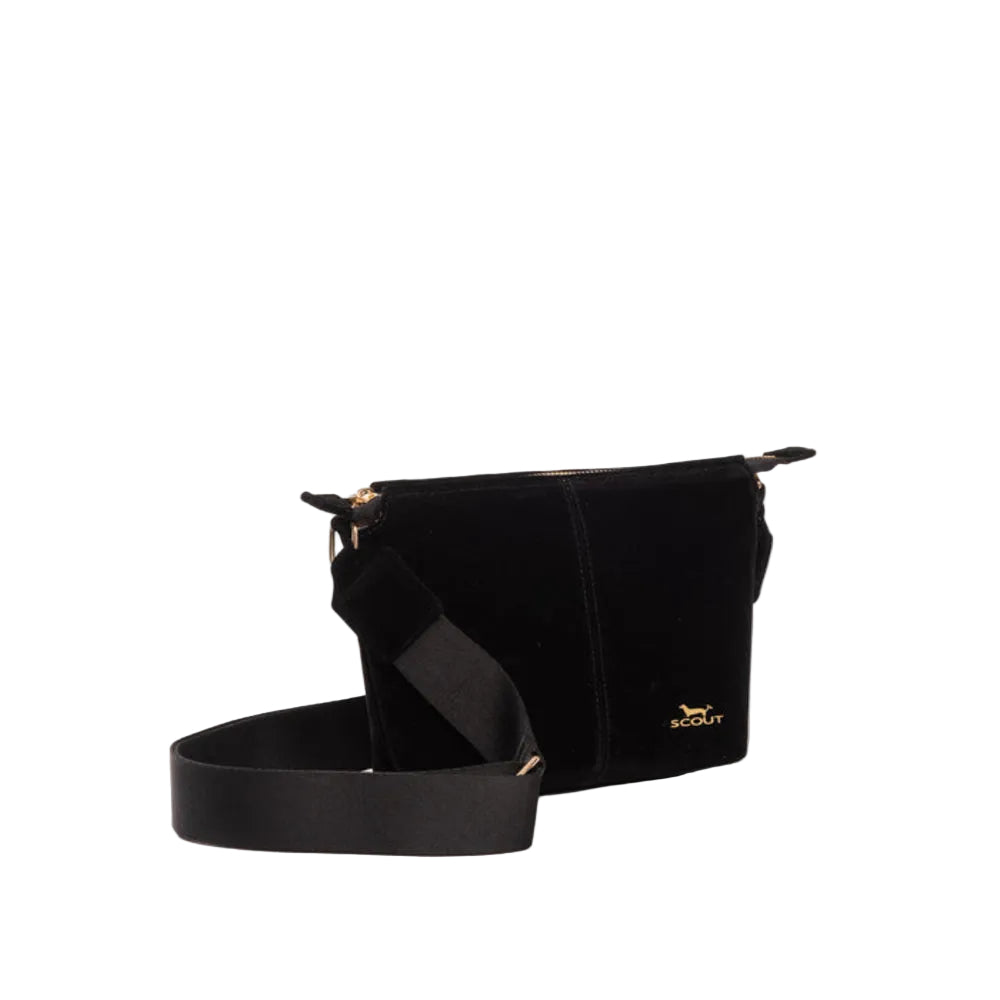 A black velvet crossbody bag with a wide black fabric strap and gold-tone hardware, featuring a small gold 'ACCOULT' logo on the front, set against a plain white studio background.