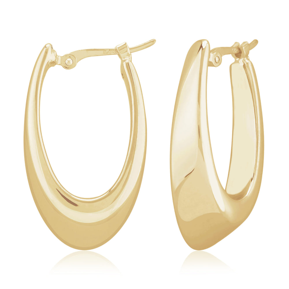 Gold hoop earrings on a white background