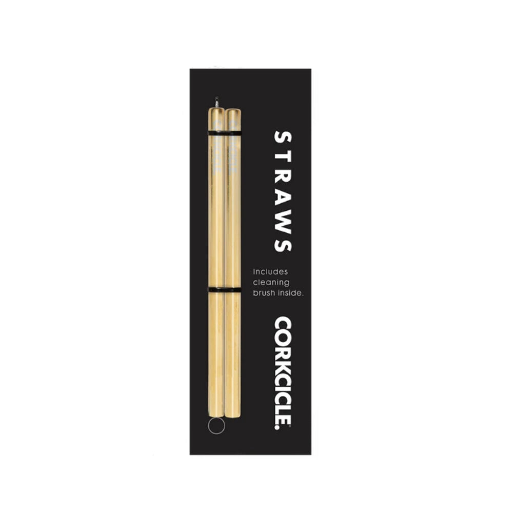 Packaged gold straws with a cleaning brush inside, branded as Corkcicle, on a white background.