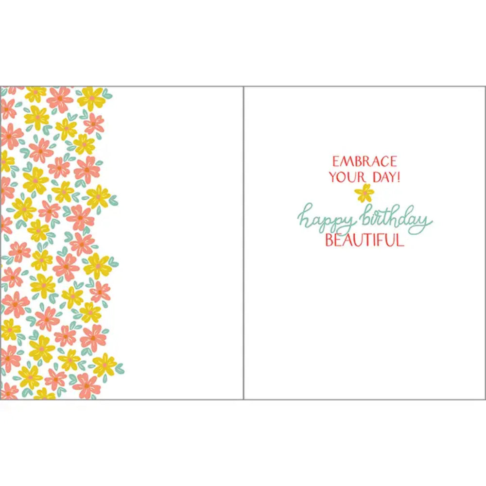 A birthday greeting card with text "embrace your day! happy birthday beautiful" on a white background. 