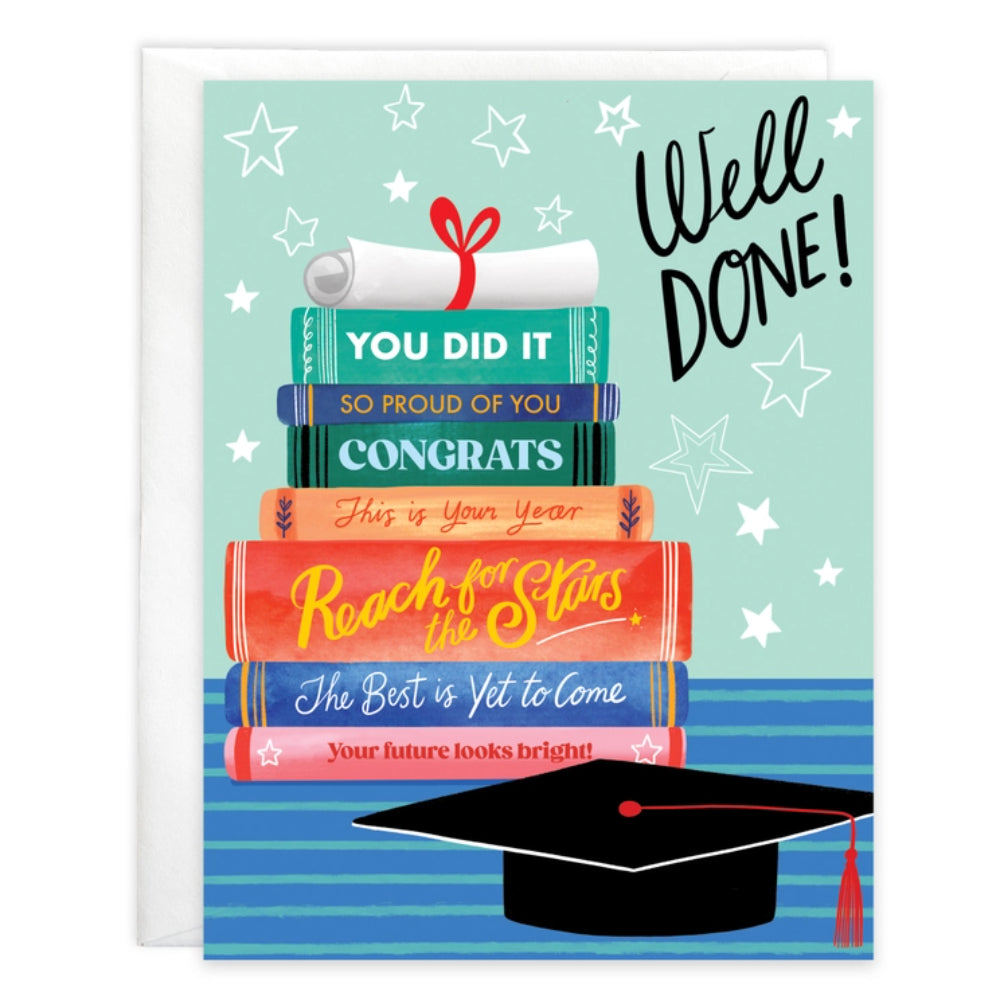 A graduation greeting card with a stack of books and a graduation cap on the front, titled 'Well Done! Congrats' with a space for a name, and the text 'The best is yet to come'.