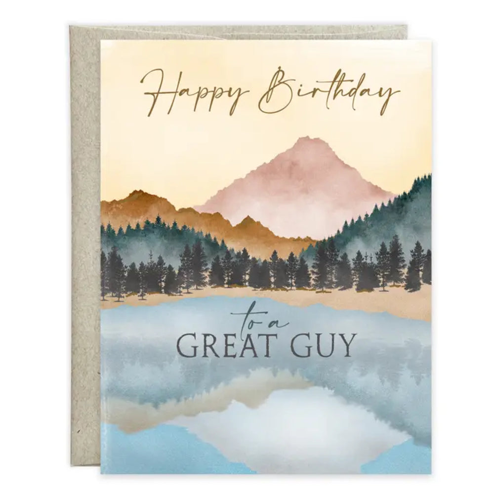 Birthday card with mountain and lake design and text 'Happy Birthday to a Great Guy'.