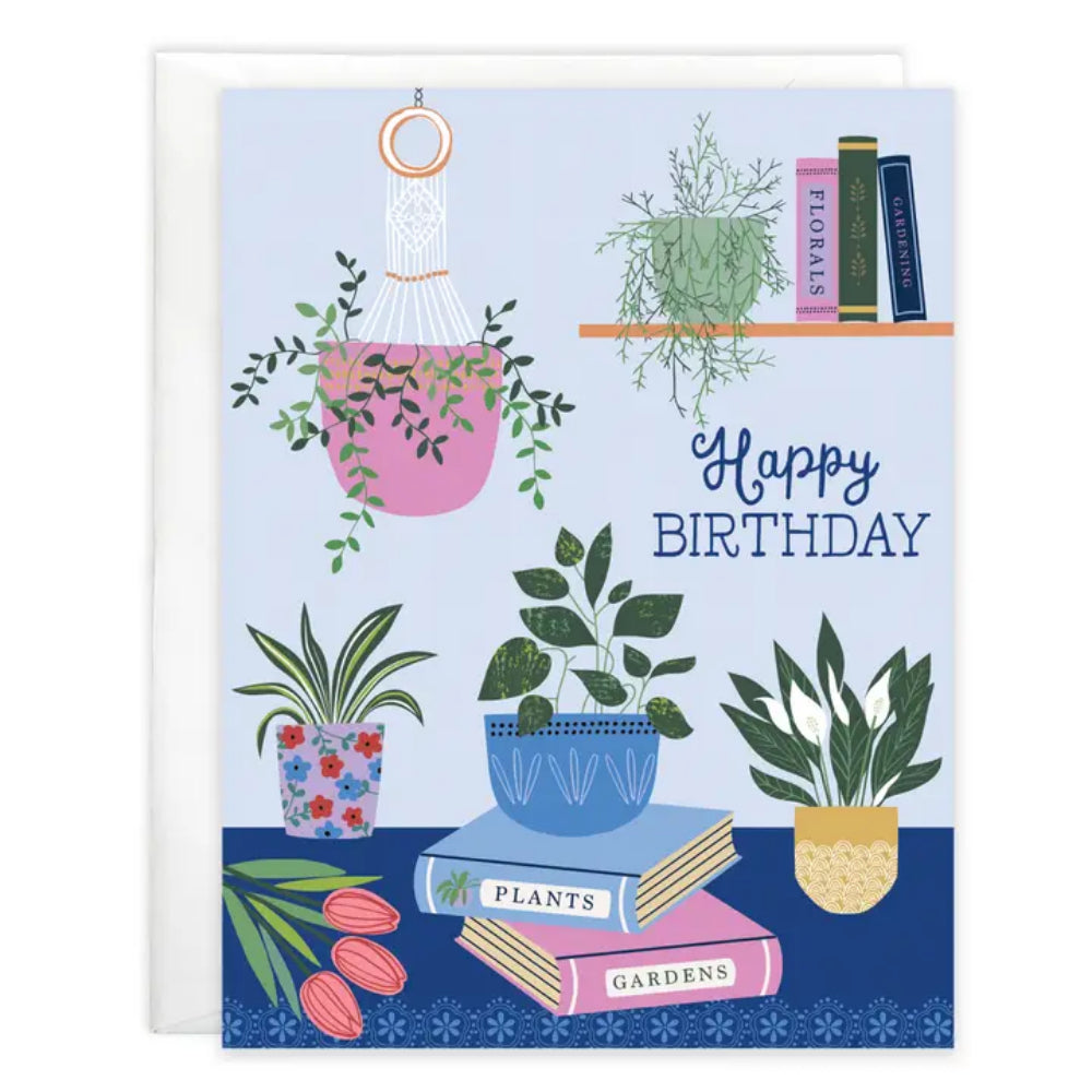 A birthday greeting card with books and plants on a white background. 