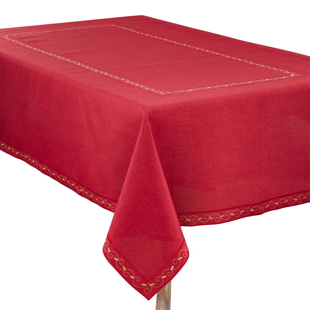 A red tablecloth with a subtle woven texture and delicate gold embroidered borders, draped over a table against a white background.