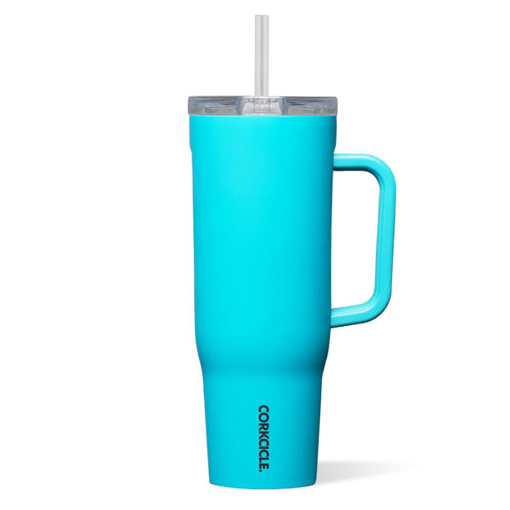 Turquoise tumbler with handle,straw and clear lid on a white background.