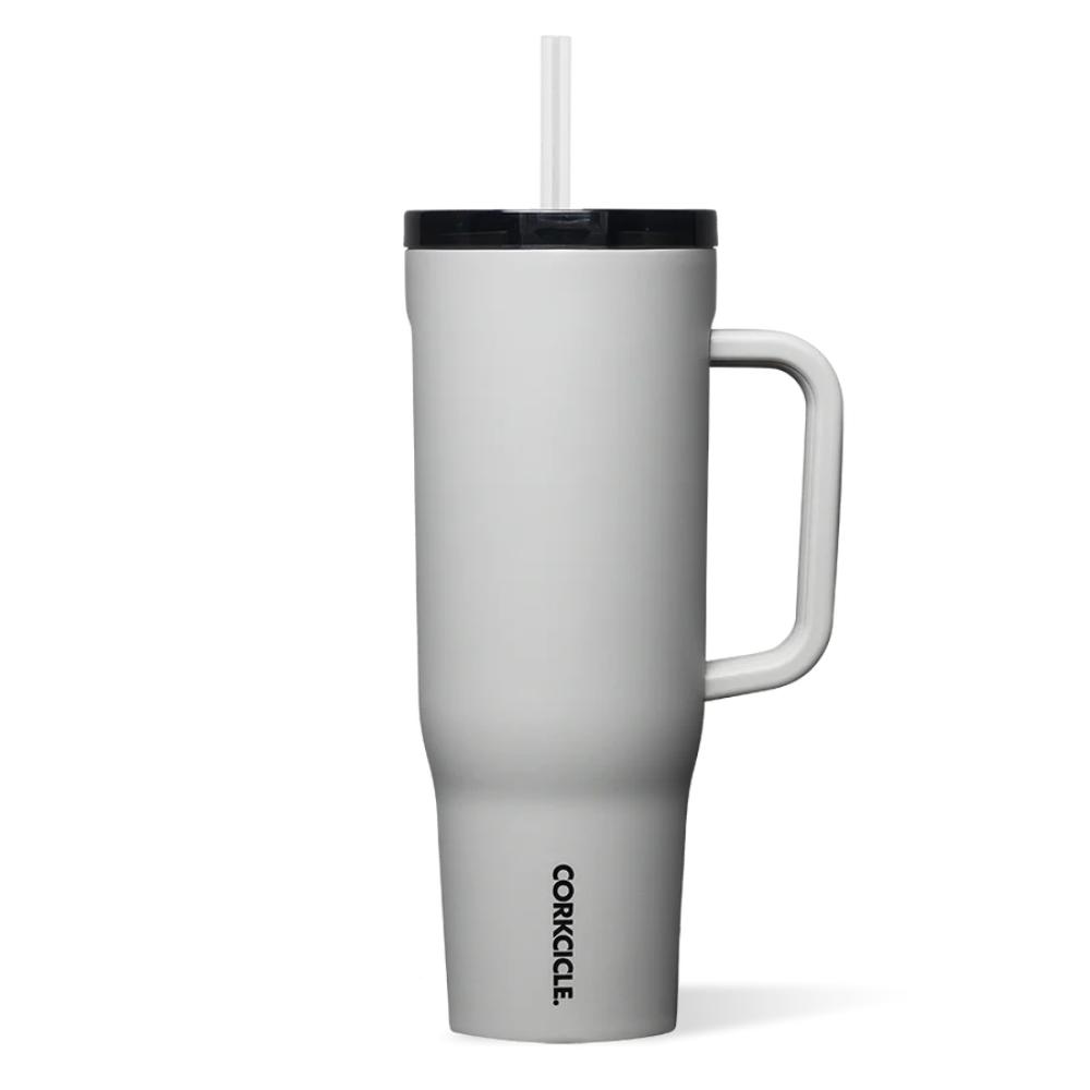Grey tumbler with handle, clear straw and black lid on a white background.