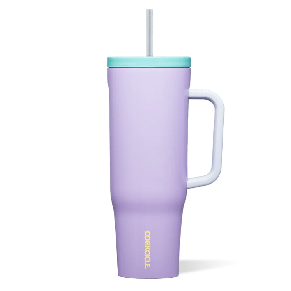 Purple tumbler with a handle and a silver straw and teal  lid on a white background.