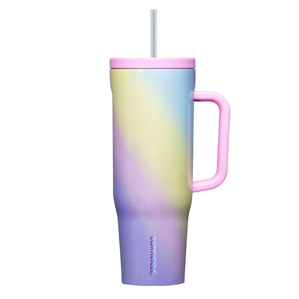 Rainbow coloered tumbler pink  handle with a silver straw and pink lid on a white backround.
