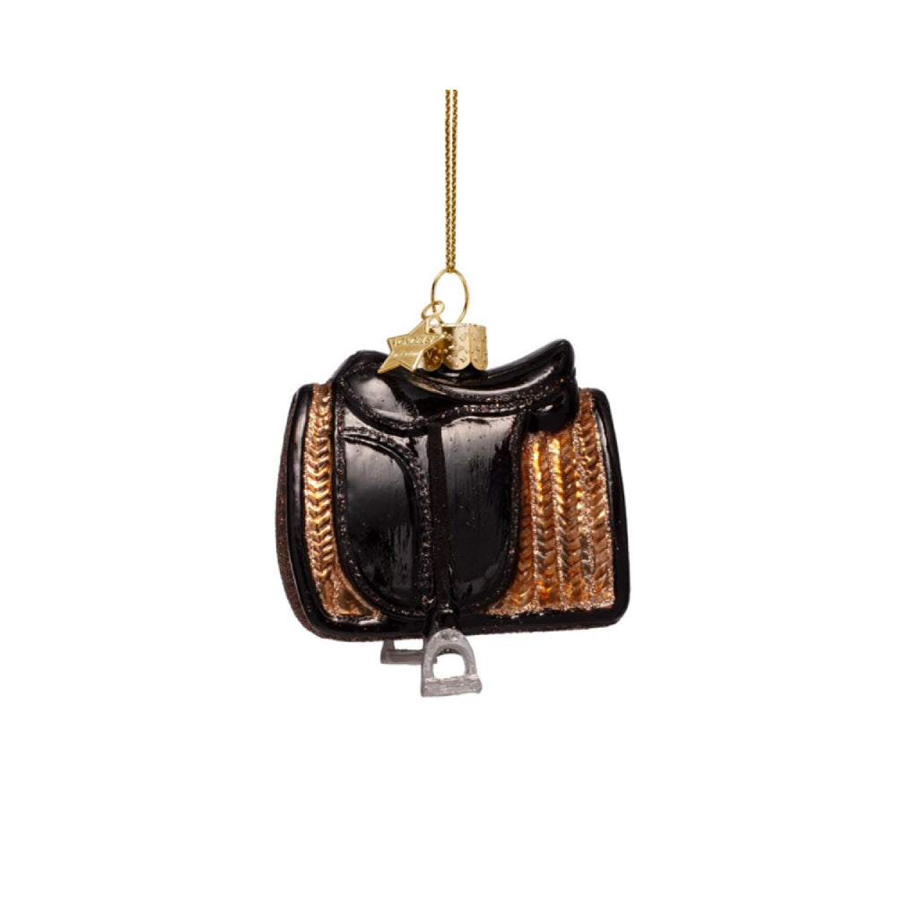 Decorative horse saddle ornament on a white background