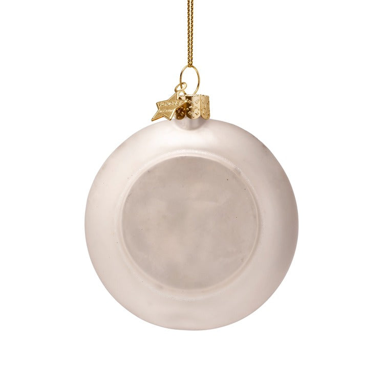 Beige Christmas ornament with gold hook on a white background