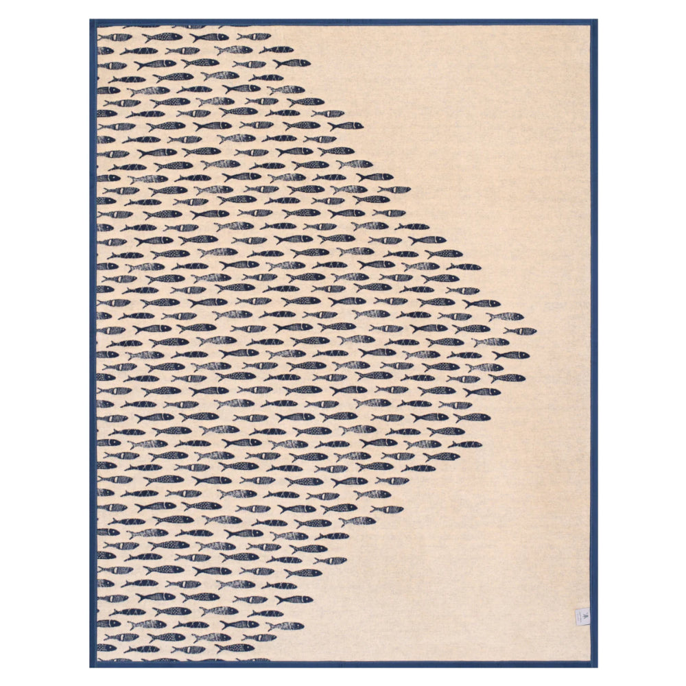 Beige blanket with navy fish pattern