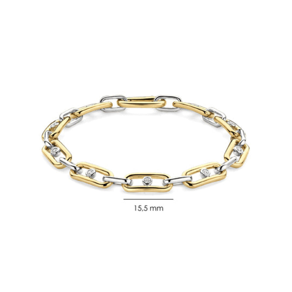 A two-tone yellow gold and silver chain link bracelet with small clear stones, shown on a white background with a 15.5 mm size indicator below.