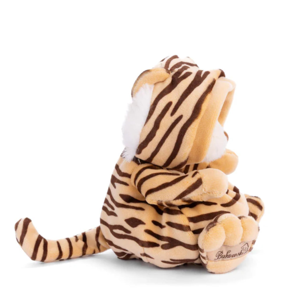 A photo of the side of a teddy bear in a tiger robe toy with brown and black stripes on a white background.