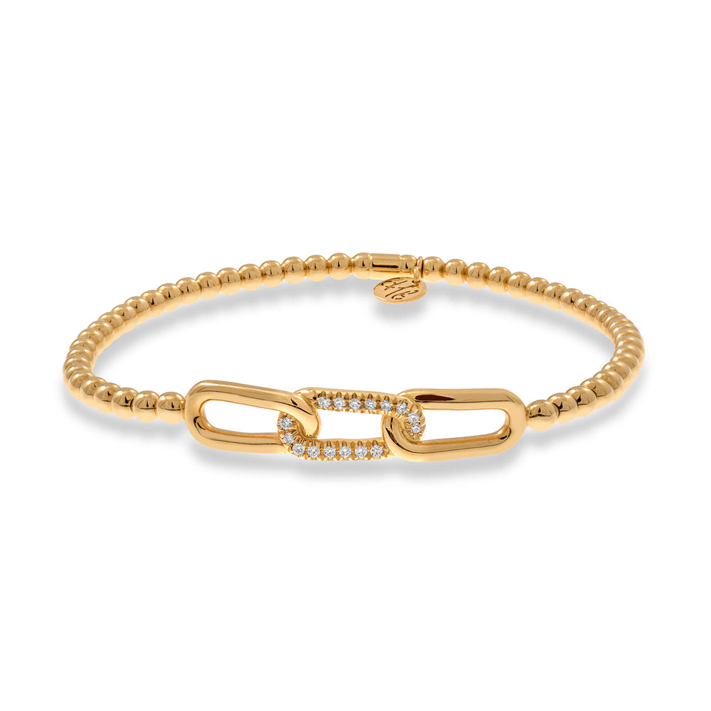 Gold beaded bracelet with a diamond-studded center link on a white background