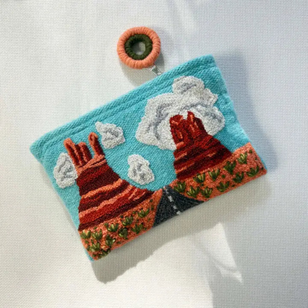 Textured pouch with a colorful design on a light background