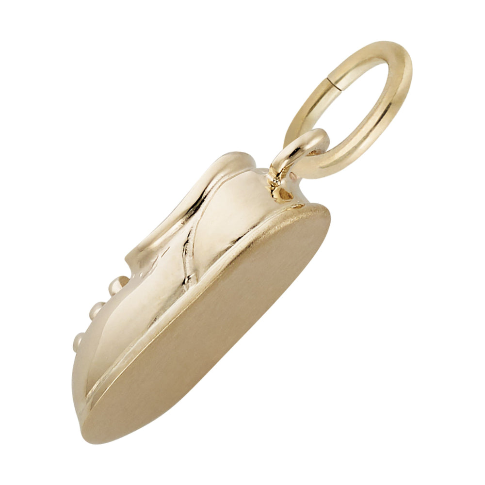 Side view of Gold Baby Shoe Shaped Charm on a white background