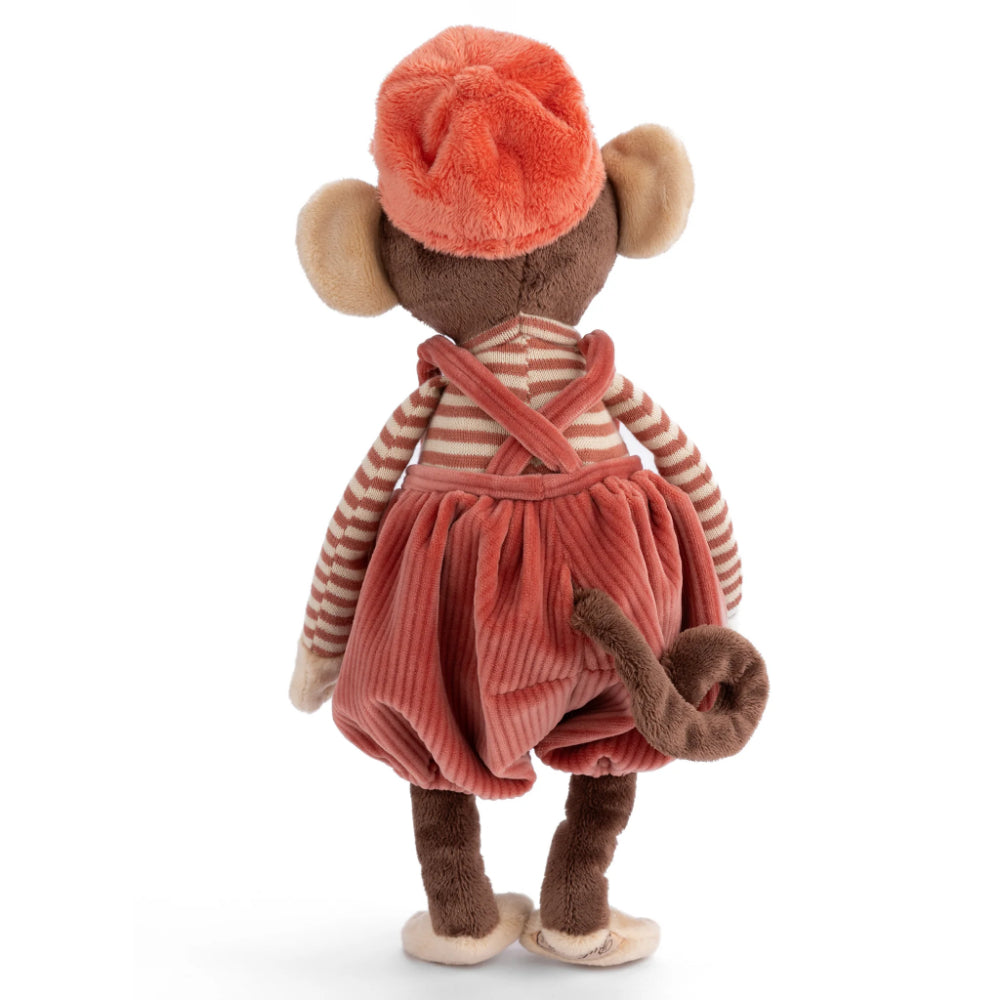 A photo of the back of a stuffed toy mouse in a striped shirt and corduroy overalls with a coral hat on a white background.
