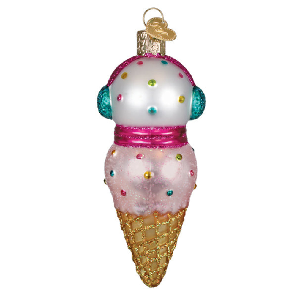 Decorative ice cream cone ornament with colorful sprinkles on a white background