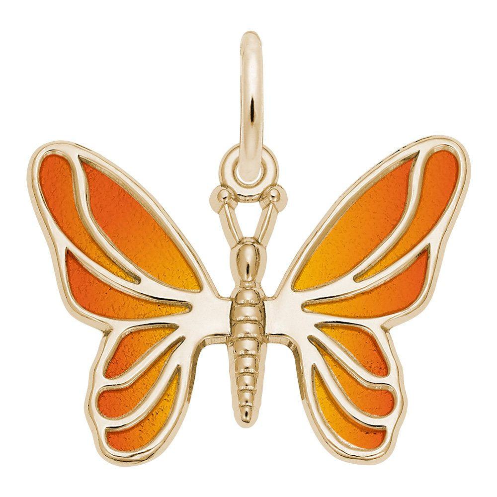 Gold butterfly pendant with orange wings on a white background