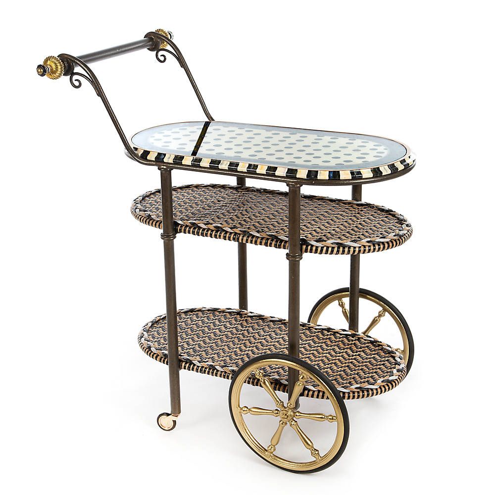 Decorative three-tiered cart with wicker design and gold accents on a white background