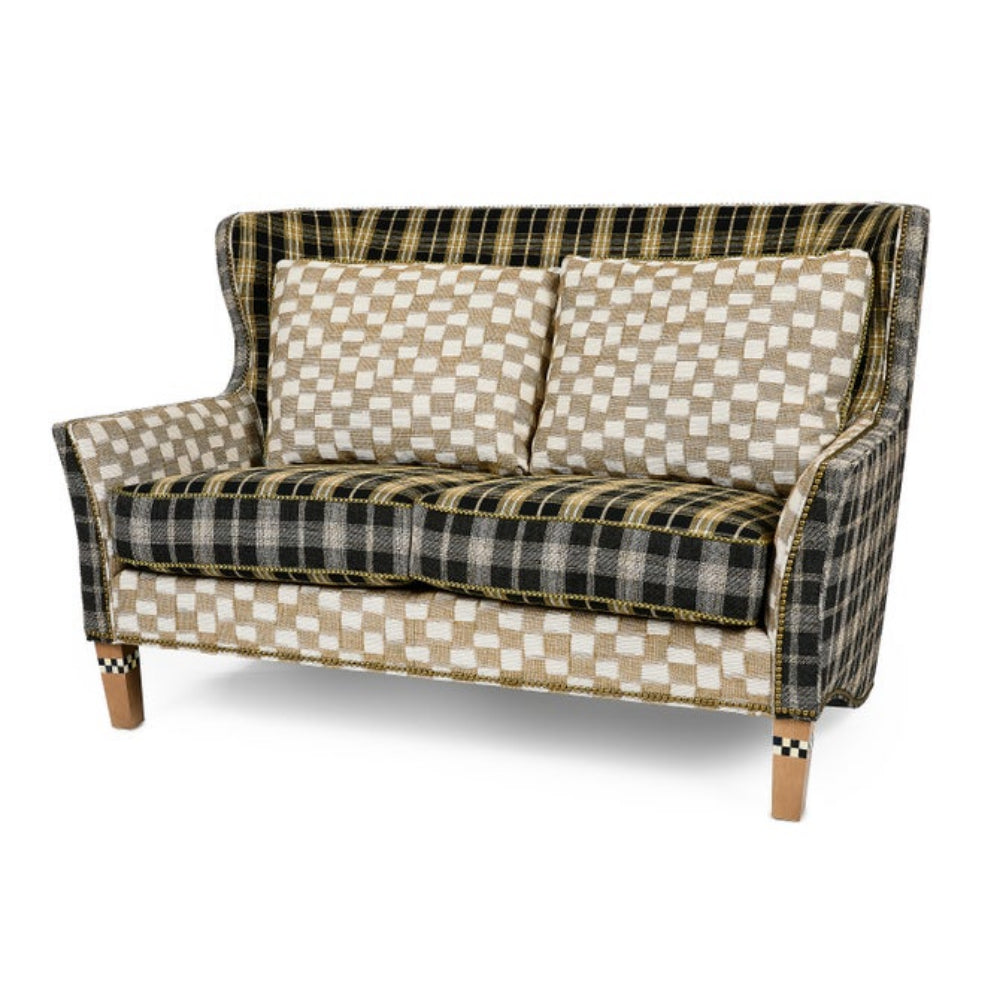 Plaid patterned sofa on a white background