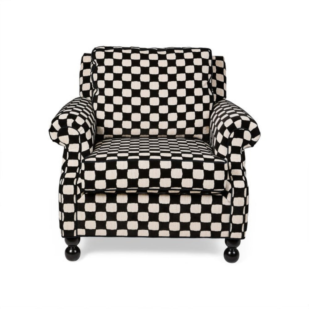 Checkered armchair with black and white pattern on a white background