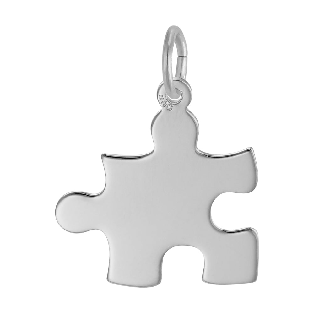 Back of Silver puzzle piece pendant on a white background
