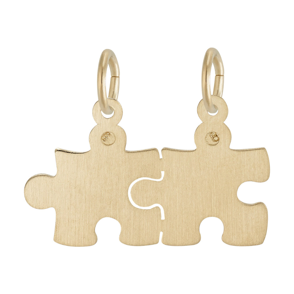 Plain Gold break apart puzzle piece charm on a white background