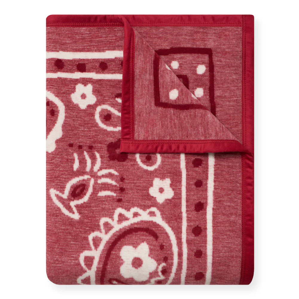 Red bandana with white patterns on a white background