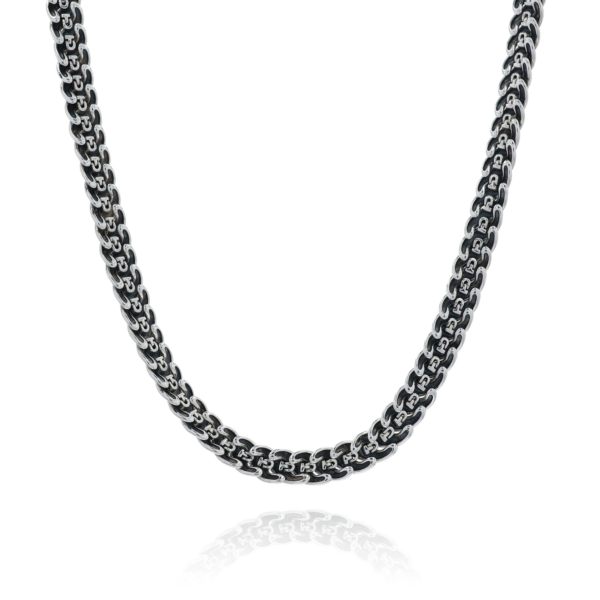 Sterling silver David Yurman chain link necklace on a white background