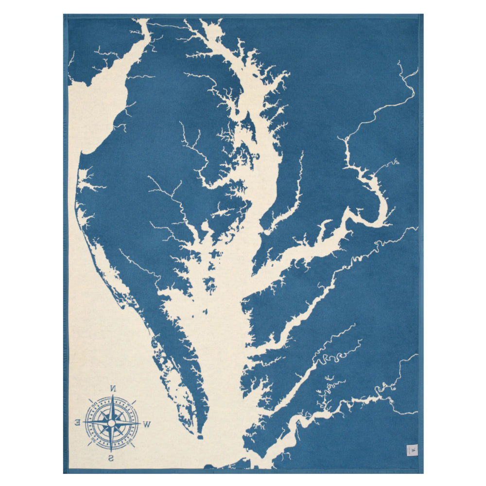 Map of a coastal area with navigational details on a blue and beige background
