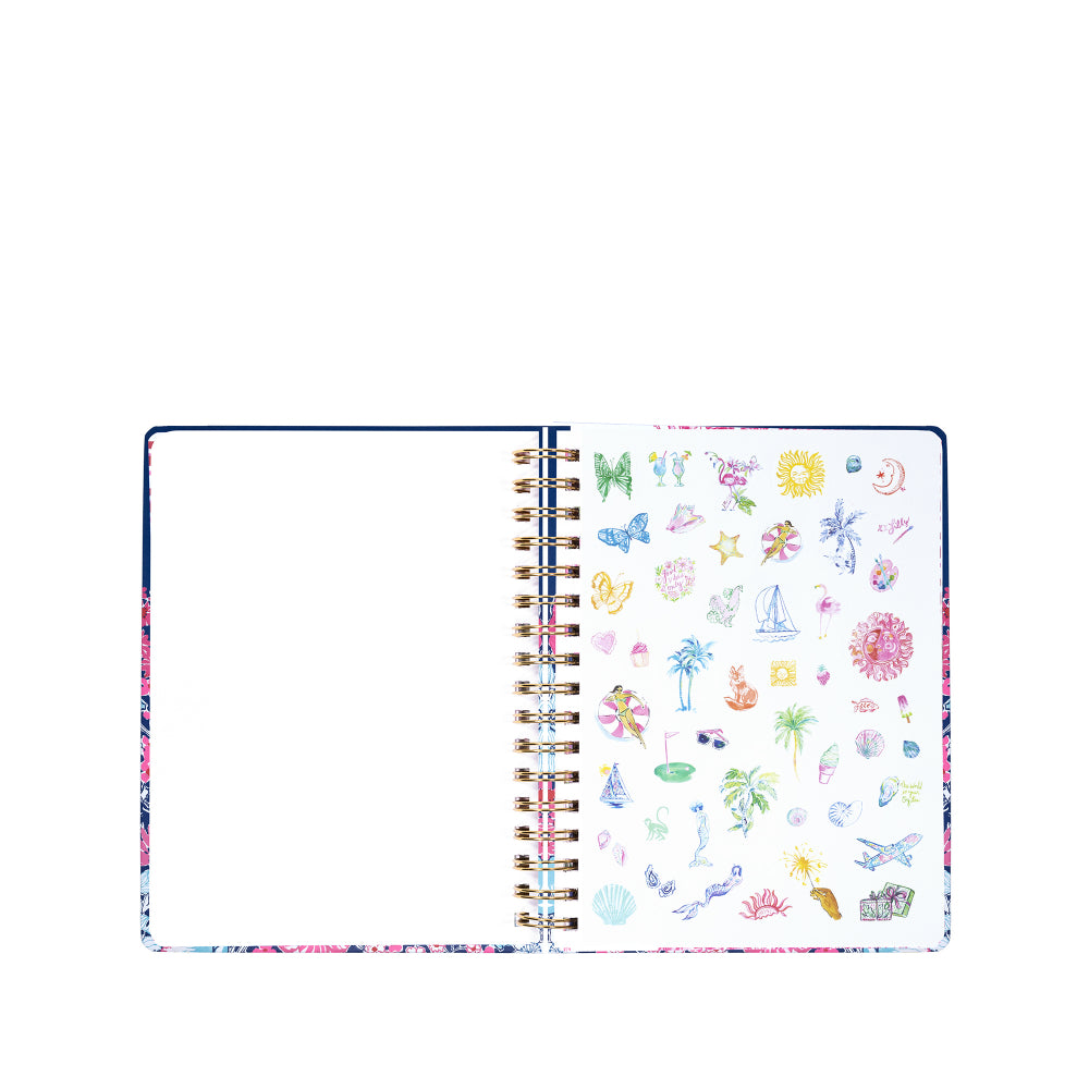 Open notebook with colorful illustrations on a white background