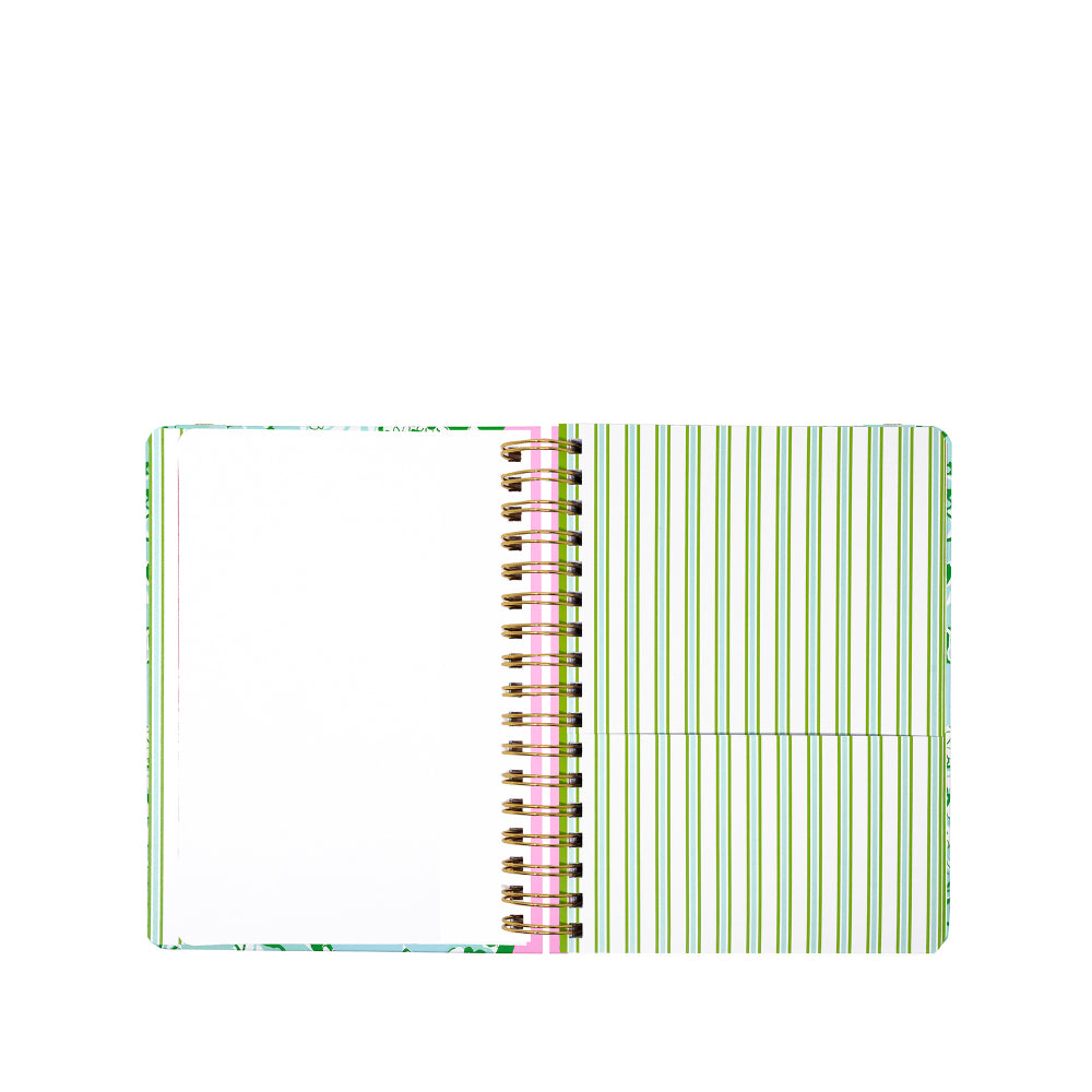Notebook with green and white striped cover on a white background