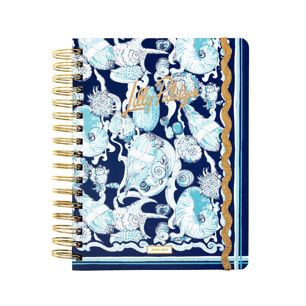Notebook with a blue and white floral pattern on a white background