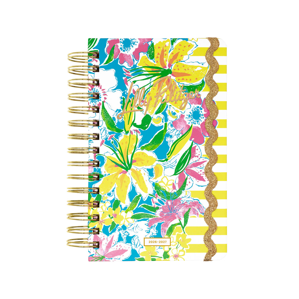 Colorful floral notebook with striped pattern on a white background