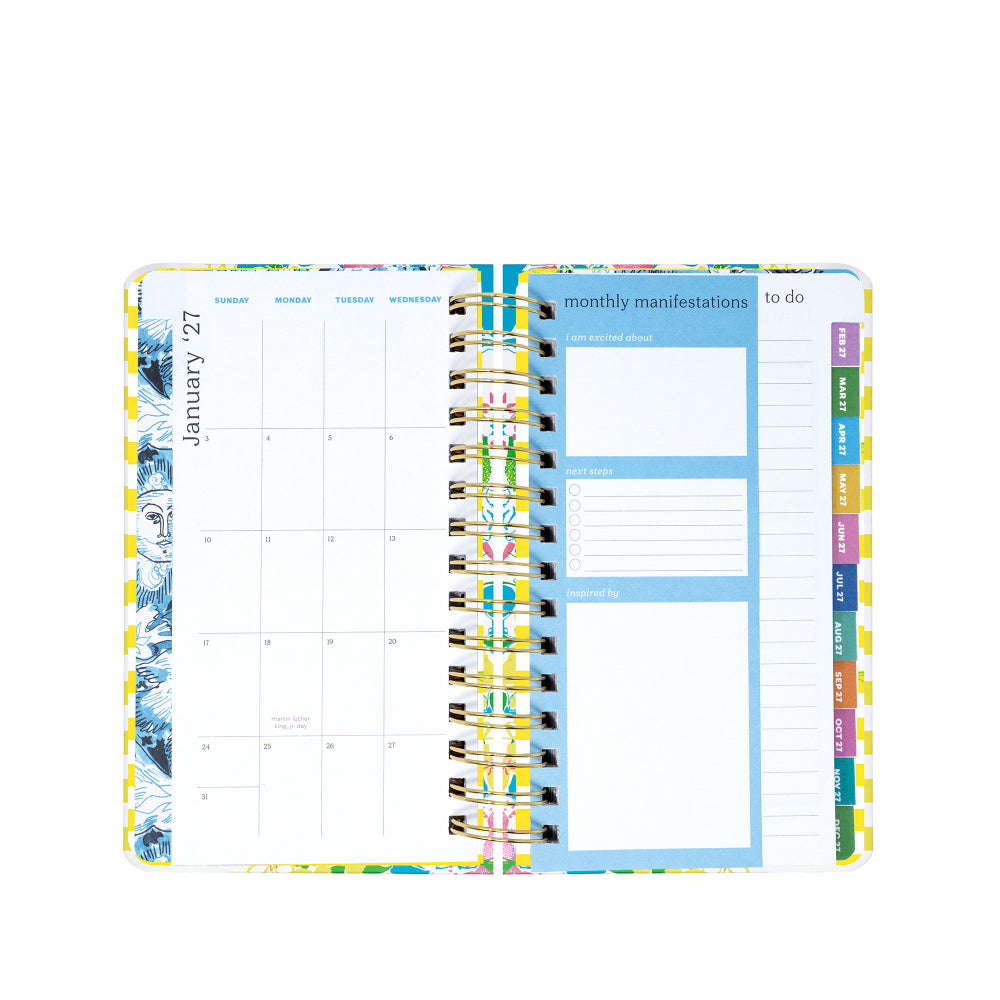 Multicolored planner with monthly and weekly layout on a white background