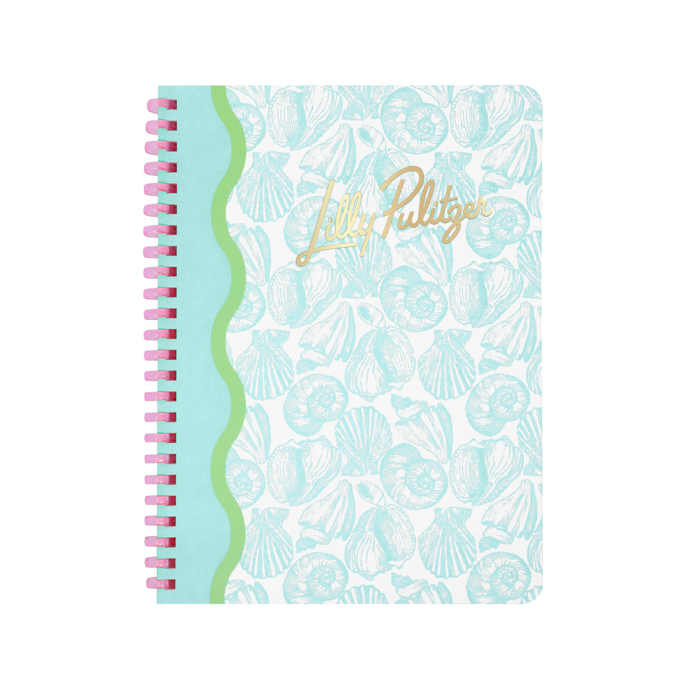A spiral-bound notebook with a mint green and white seashell pattern cover, featuring a wavy mint green border on the left side, pink spiral binding, and gold foil 'Lilly Pulitzer' script on the front, shown against a plain white background.