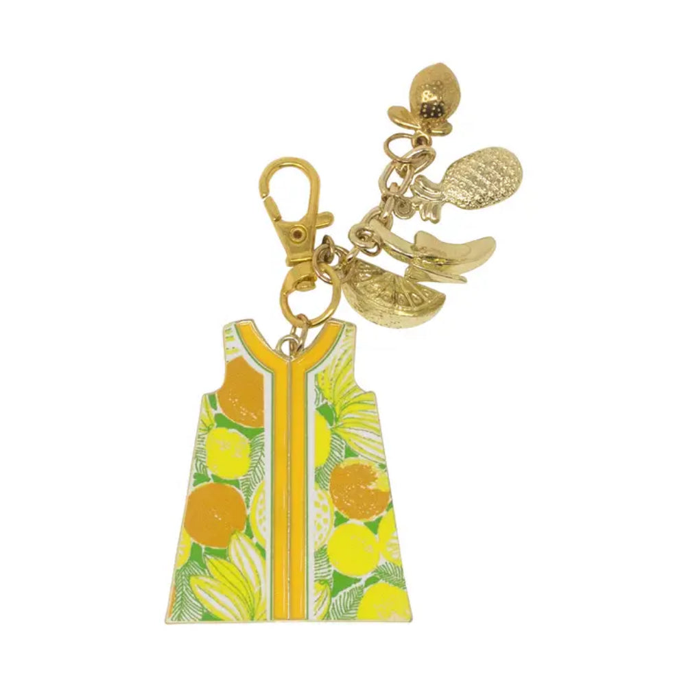 Keychain with dress and lemon design on a white background