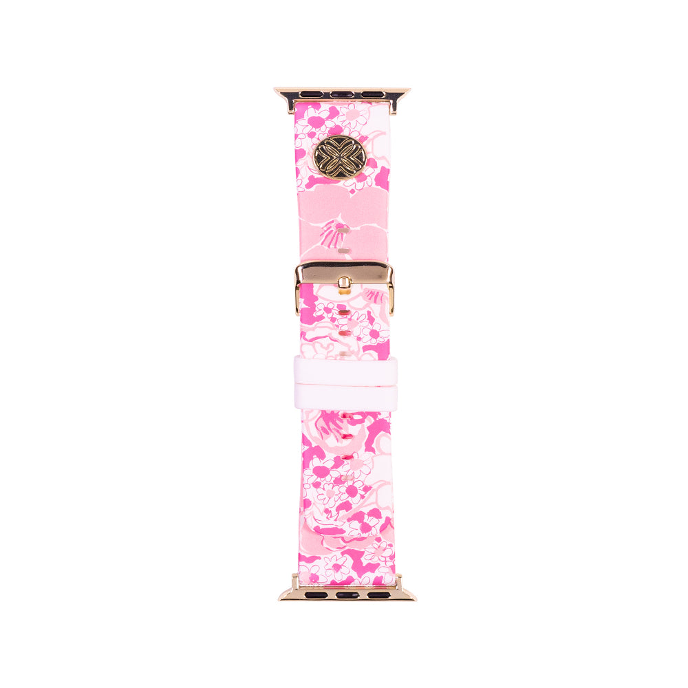 A pink and white floral patterned watch band with gold-toned hardware, shown vertically against a solid white background.