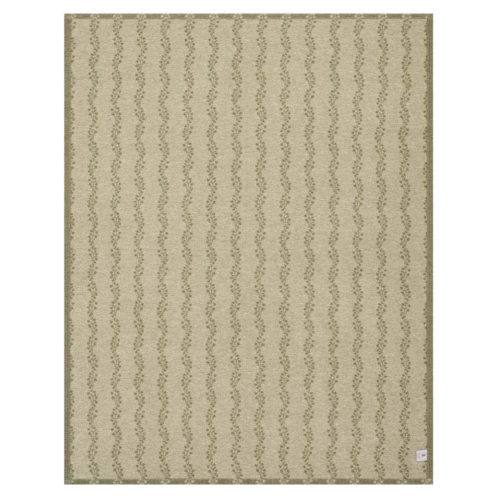 A rectangular area rug with a vertical wavy stripe pattern in olive green and beige, shown flat against a white background.